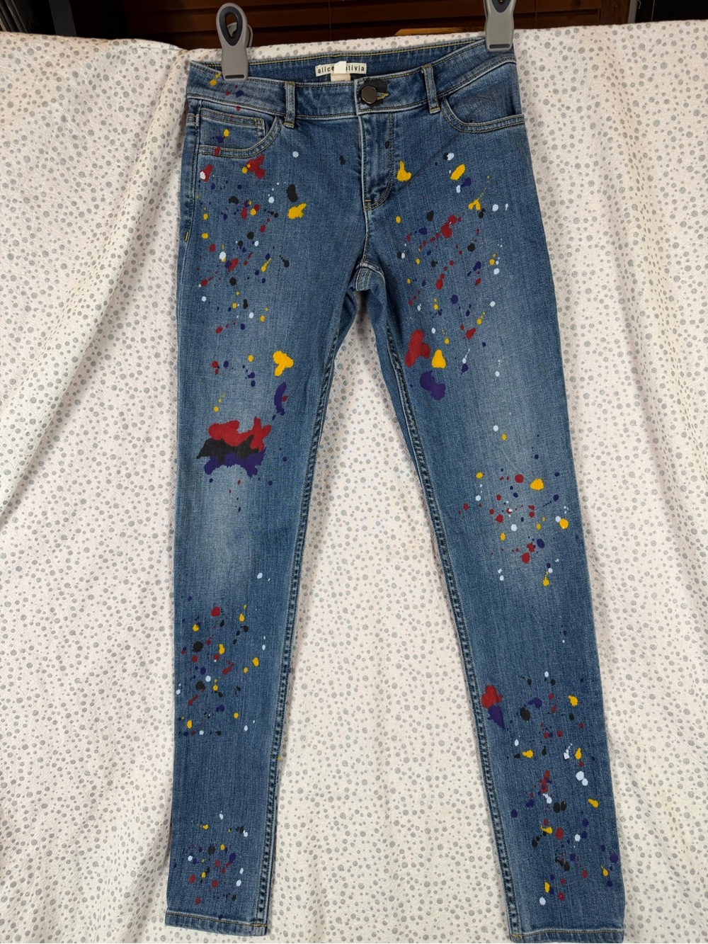 Alice + Olivia Medium Blue Skinny Jeans with Multicolored Paint Splatters